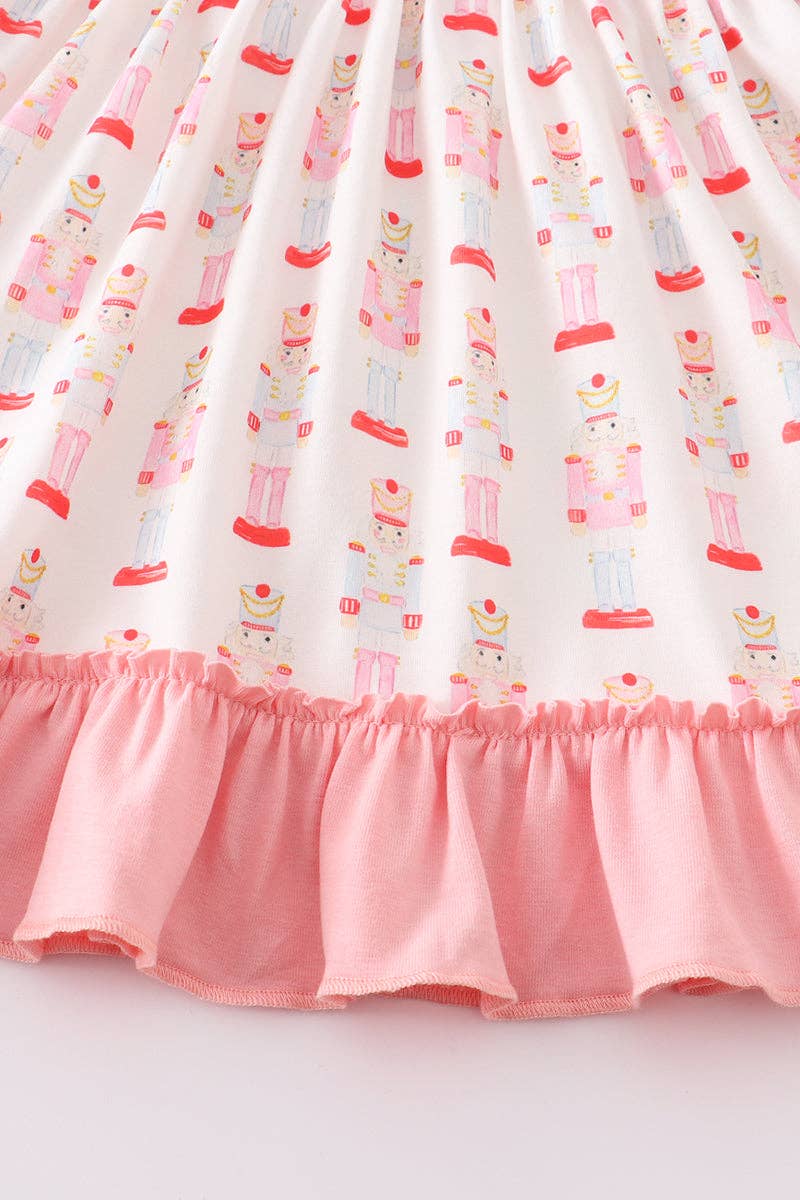 Pink nutcracker print ruffle dress